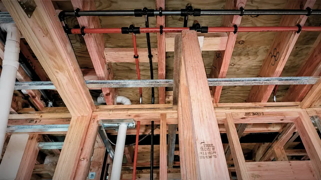 Plumbing rough-in pipework inside a Hamilton new build under construction